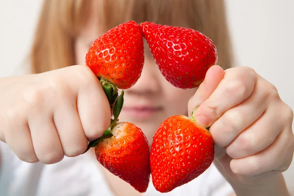 Little girl with strawberries — Stock Photo, Image