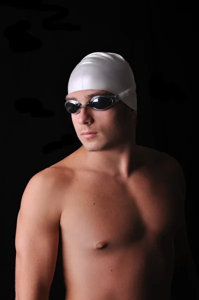 Male swimmer isolated in black — Stock Photo, Image