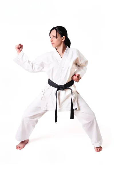 Karate mujer en posición de defensa aislada en blanco — Foto de Stock