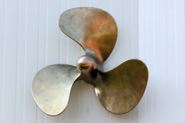 Propeller nailed to the wall clipart