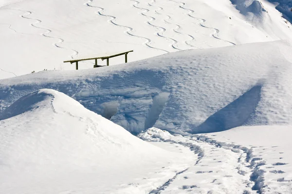 stock image Snowboard tracks in alps snowscape