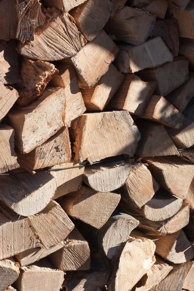 stock image Stacked logs of chopped wood