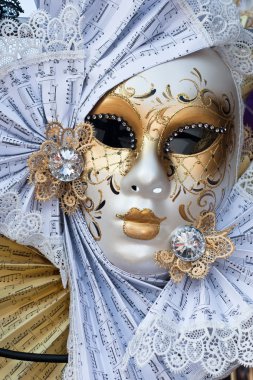 Yellow and white venice carnival mask clipart