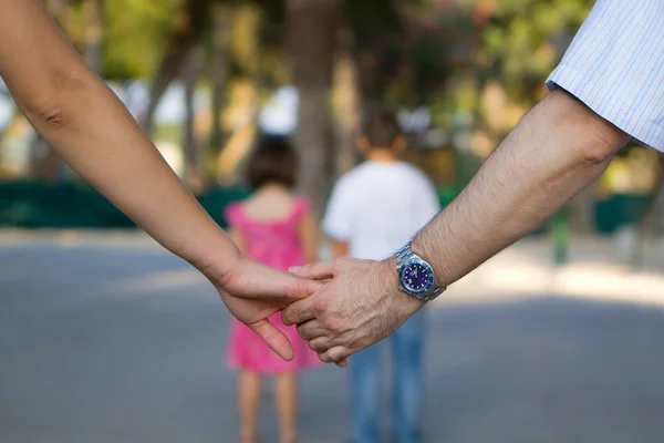 Parents Holding Hands with Kids in Front — Stock Photo, Image