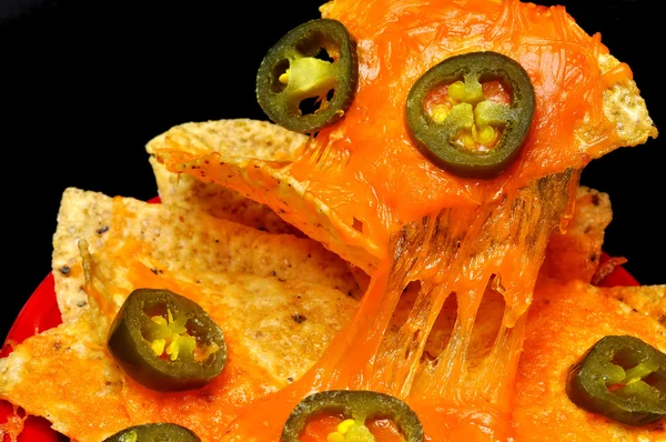 Nachos met jalapeno pepers — Stockfoto