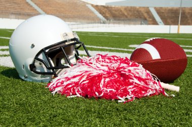 Amerikan futbol, kask ve pom poms