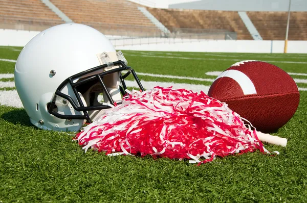 Americký fotbal, helmu a pom cedulky — Stock fotografie