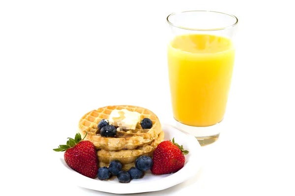 Café da manhã com waffles e suco de laranja — Fotografia de Stock