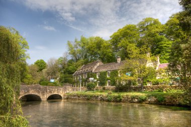 Typical Cotswolds scenary in Bibury clipart