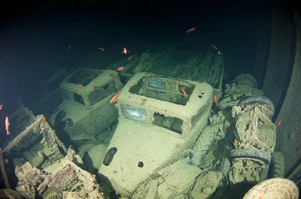 Truck inside the hold of a large shipwreck — Stock Photo, Image