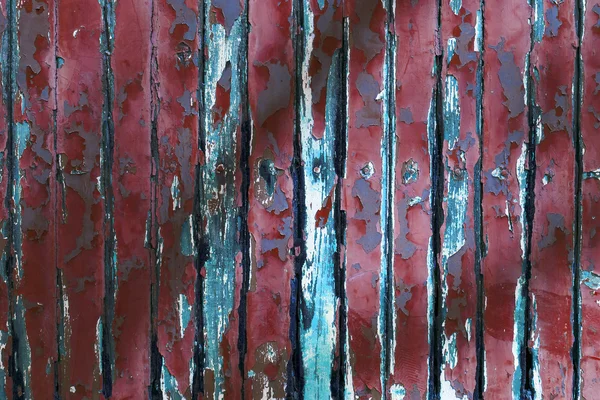 Gamla röda chipping trä wall — Stockfoto