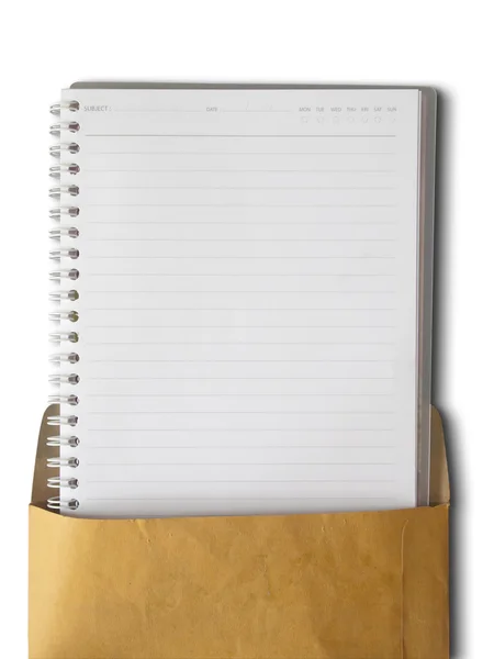 Notebook linhas de whit em um envelope marrom — Fotografia de Stock