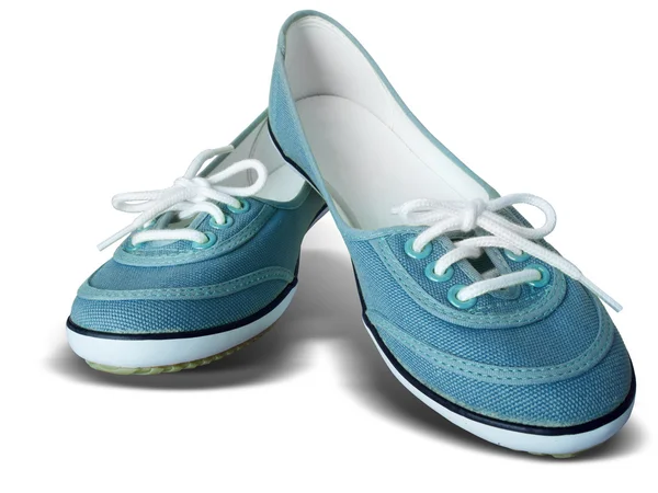 รองเท้าผ้าสีฟ้าบนพื้นหลังสีขาว — ภาพถ่ายสต็อก