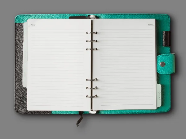 Capa de couro preto e verde do notebook aglutinante — Fotografia de Stock