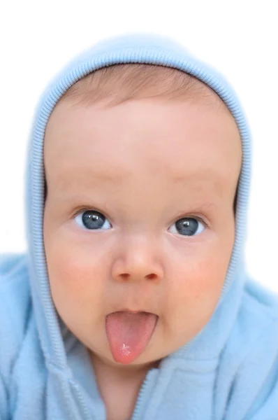 Bebê menino colocar a língua — Fotografia de Stock