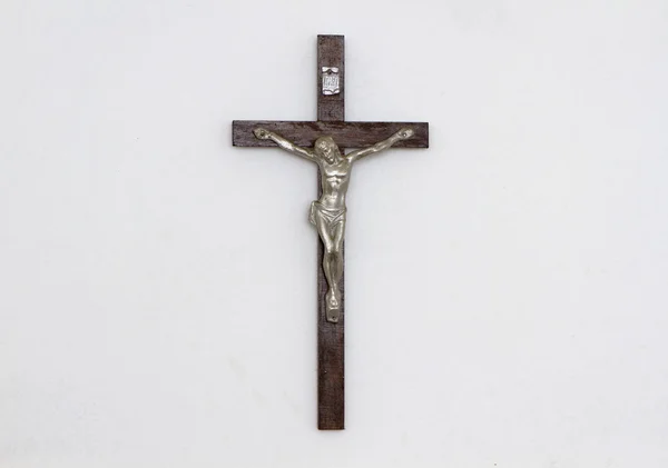 Figurine de Jésus crucifié sur le mur Photo De Stock