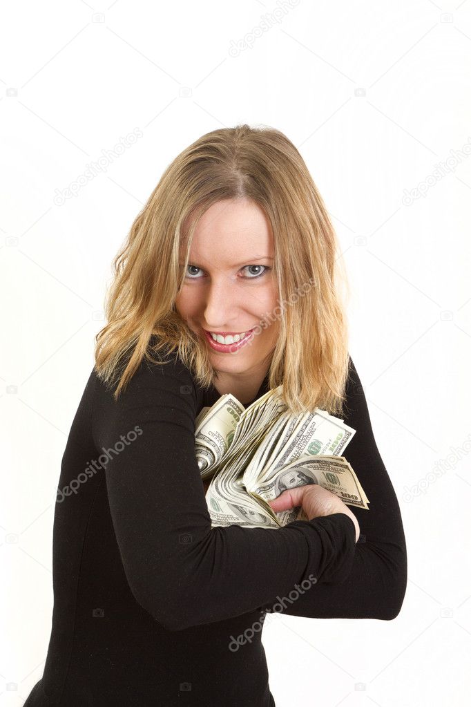 Young woman hiding dollars and have greedy face