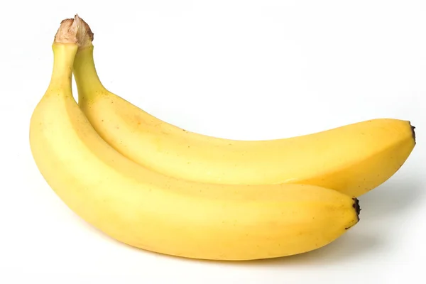 Duas bananas isoladas em branco. caminho de recorte incl . — Fotografia de Stock