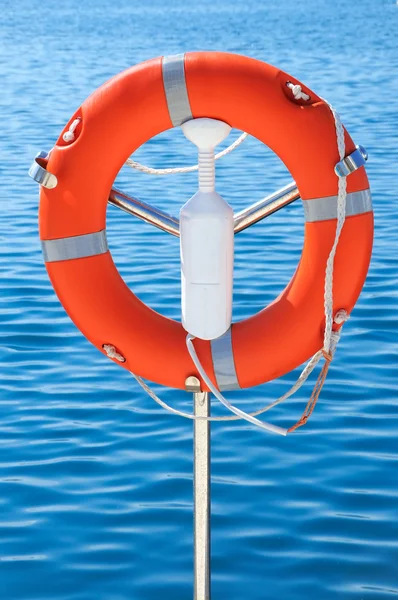 Safety orange buoy on ship — Stock Photo, Image