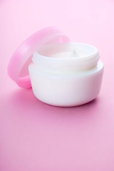 Container of cosmetic moisturizing cream — Stock Photo, Image