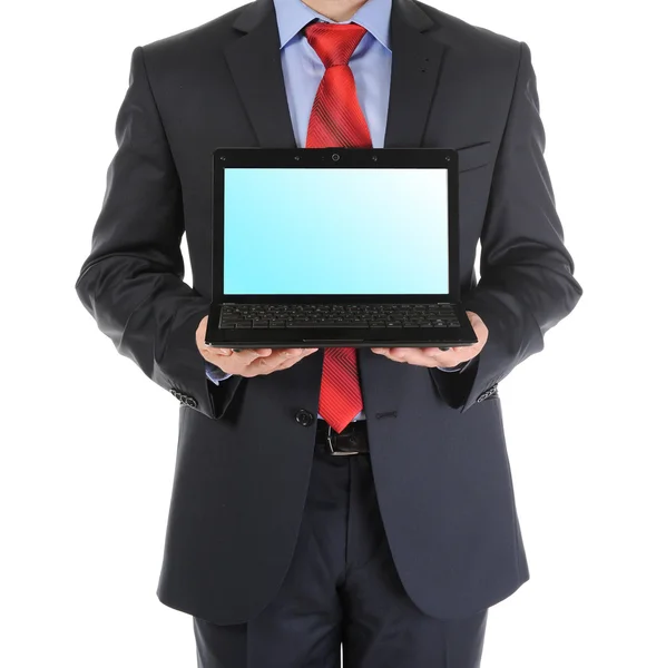 Podnikatel drží otevřený laptop — Stock fotografie