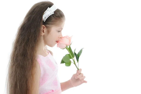 Маленька дівчинка з трояндою . — стокове фото