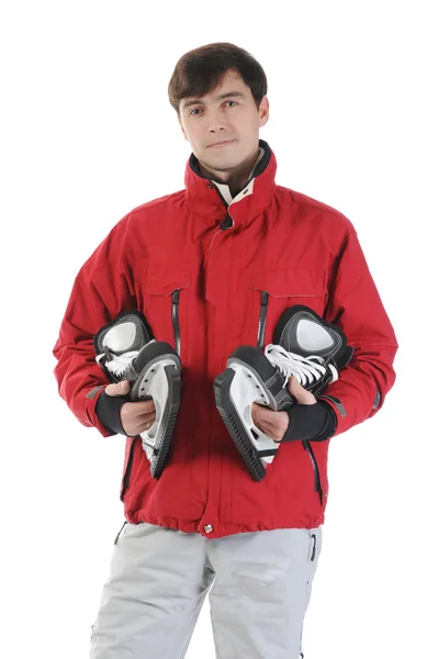 Человек с коньками — стоковое фото