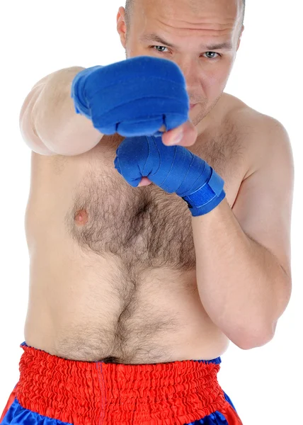 Experienced adult fighter punches during training. — Stock Photo, Image