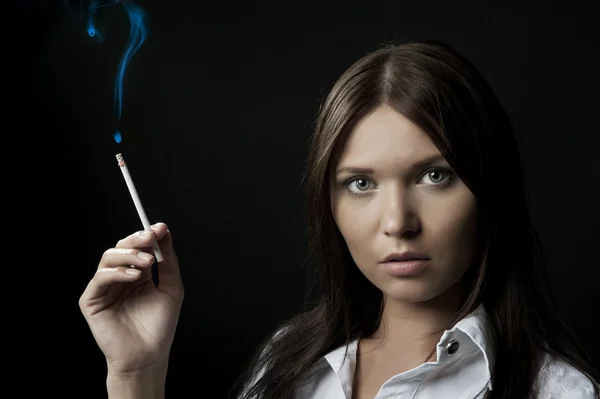 Girl with a cigar in a hand — Stock Photo, Image