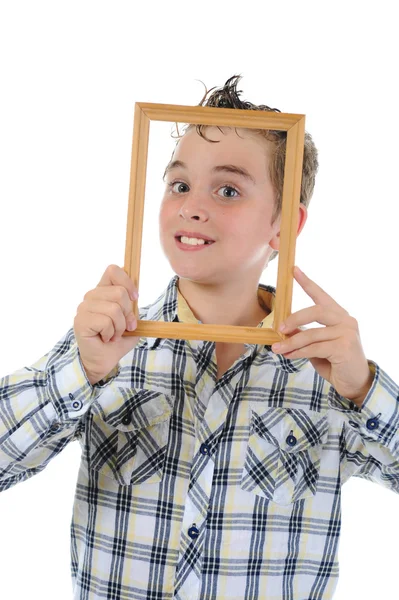 Malý chlapec s rámem v jeho rukou — Stock fotografie