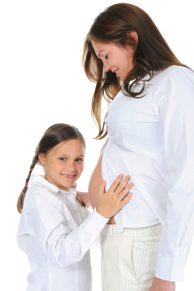 Schwangere Frau mit ihrer Tochter — Stockfoto