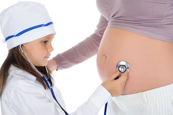Pregnant woman with her daughter — Stock Photo, Image