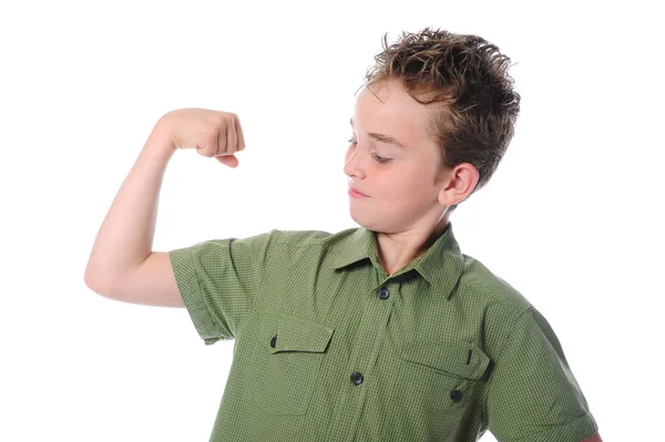 O menino mostra seus músculos — Fotografia de Stock