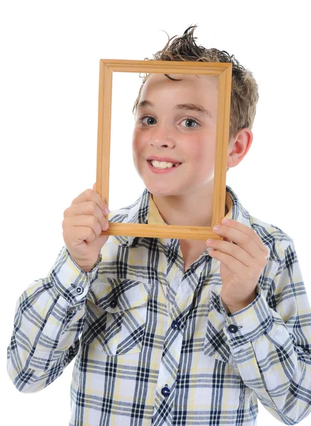 Malý chlapec s rámem v jeho rukou — Stock fotografie