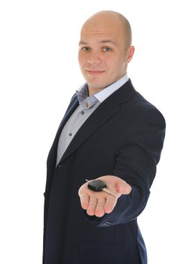 Businessman gives the keys to the car clipart