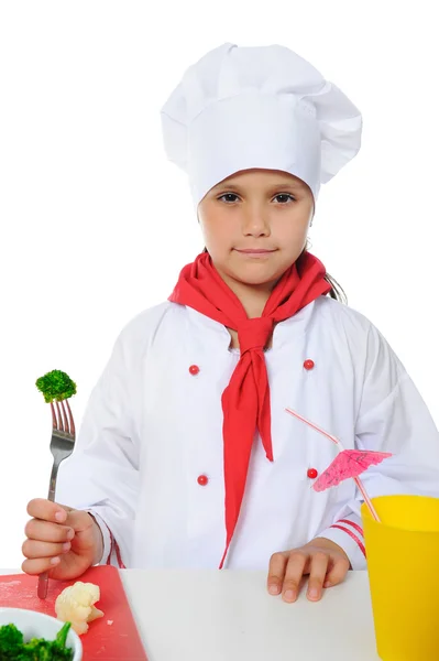 Malý kuchař v uniformě. — Stock fotografie