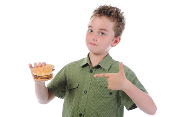 Menino comendo um hambúrguer — Fotografia de Stock