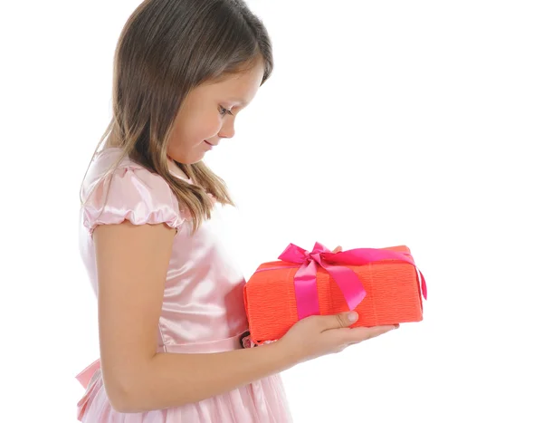 Маленька дівчинка з подарунковою коробкою Ліцензійні Стокові Зображення