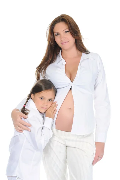 Terhes nő a lányával. — Stock Fotó