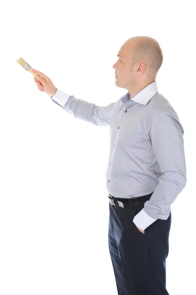 Podnikatel s kartáčem v ruce — Stock fotografie