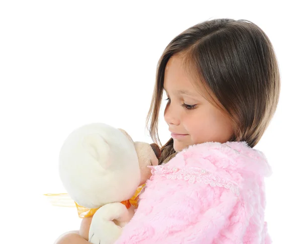 Menina abraçando seu brinquedo de urso de pelúcia — Fotografia de Stock