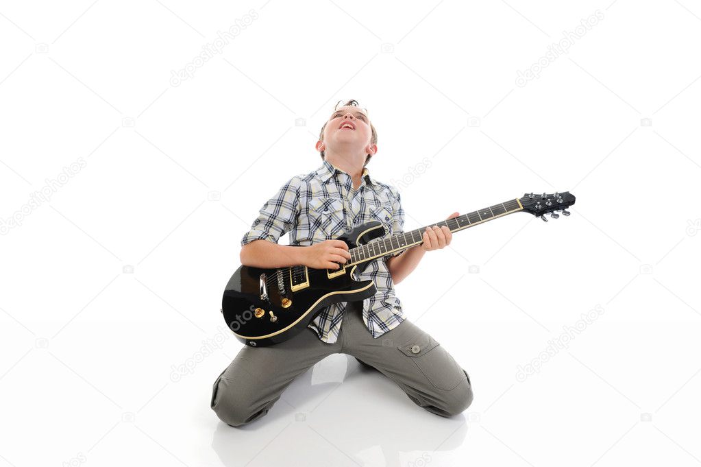Little musician playing guitar