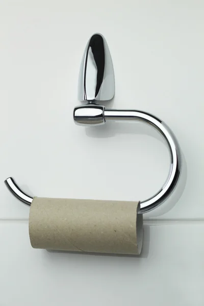 Suporte de rolo de toalete com rolo vazio Fotos De Bancos De Imagens