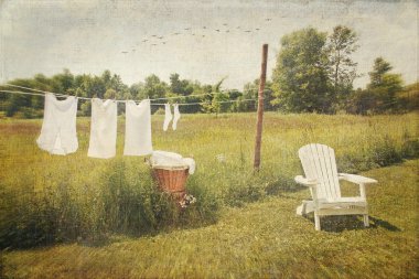 White cotton clothes drying on a wash line clipart