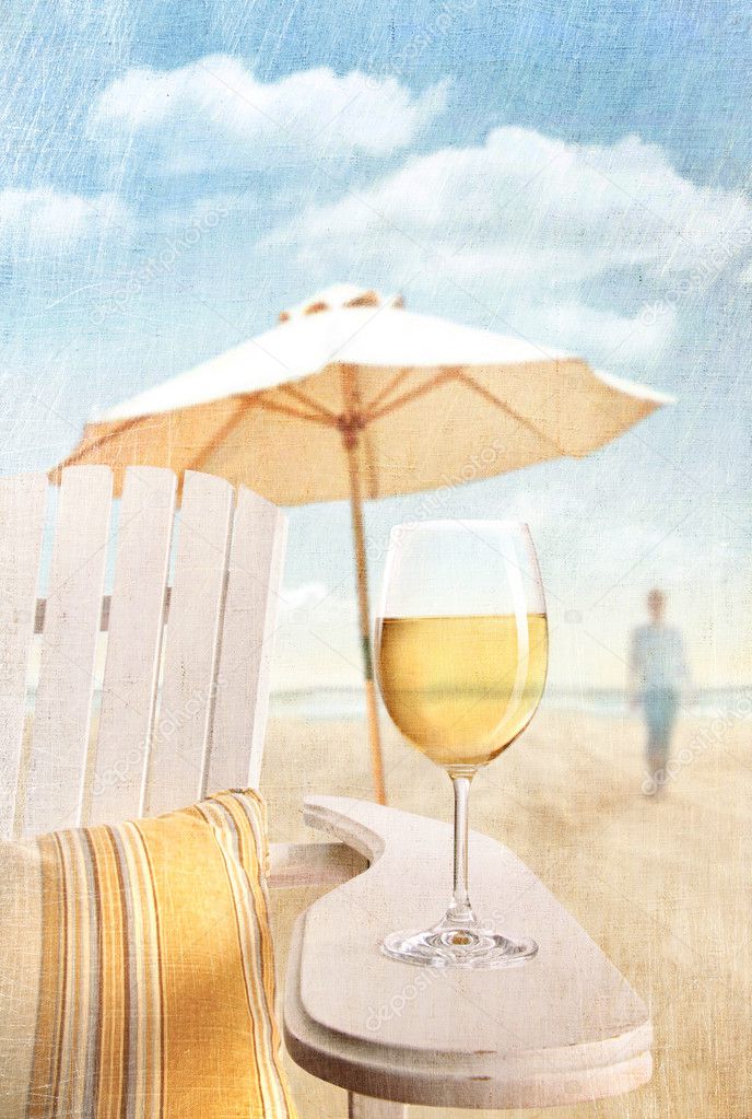 Glass of wine on adirondack chair at the beach — Stock 