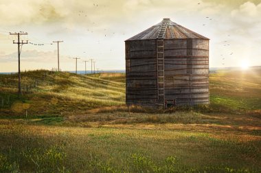 Abandoned wood grain storage bin in Saskatchewan clipart