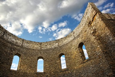 Ruin wall with windows of an old church clipart