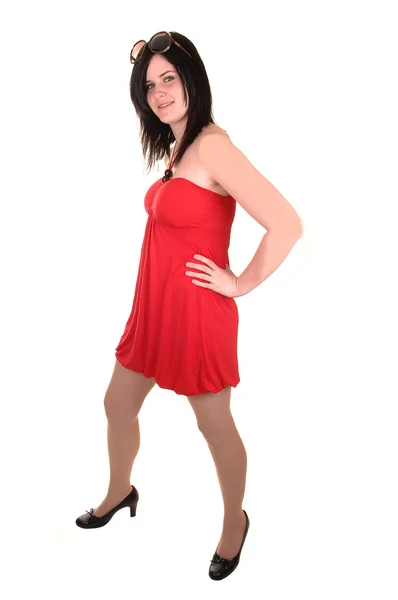 Meisje in rode jurk. — Stockfoto