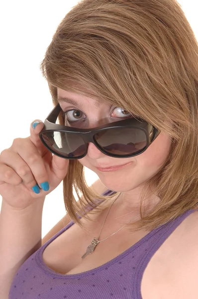 Girl looking over sunglasses. — Stock Photo, Image