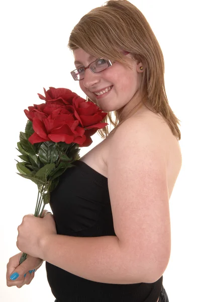 女孩与玫瑰的特写. — 图库照片